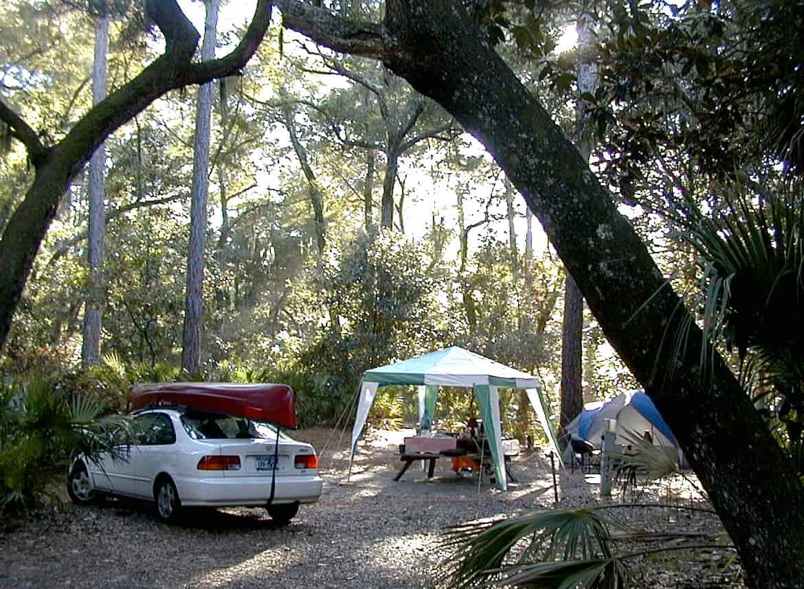 A campsite beside water