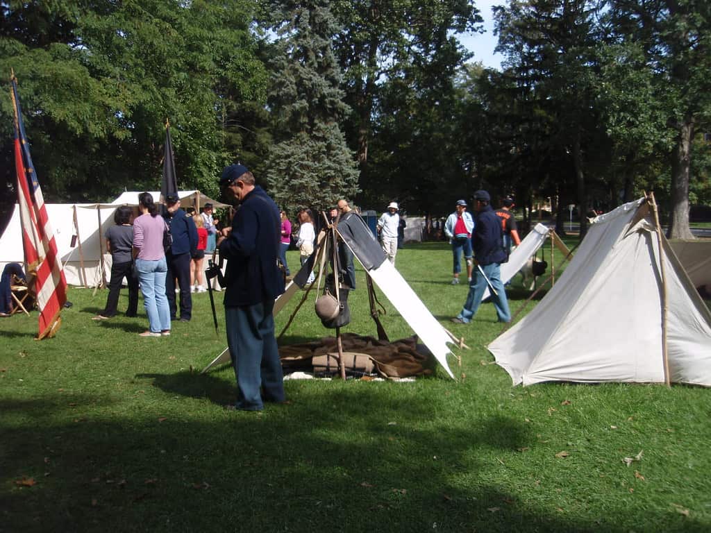 A tent pitched on grass showing the ground beneath the tent floor