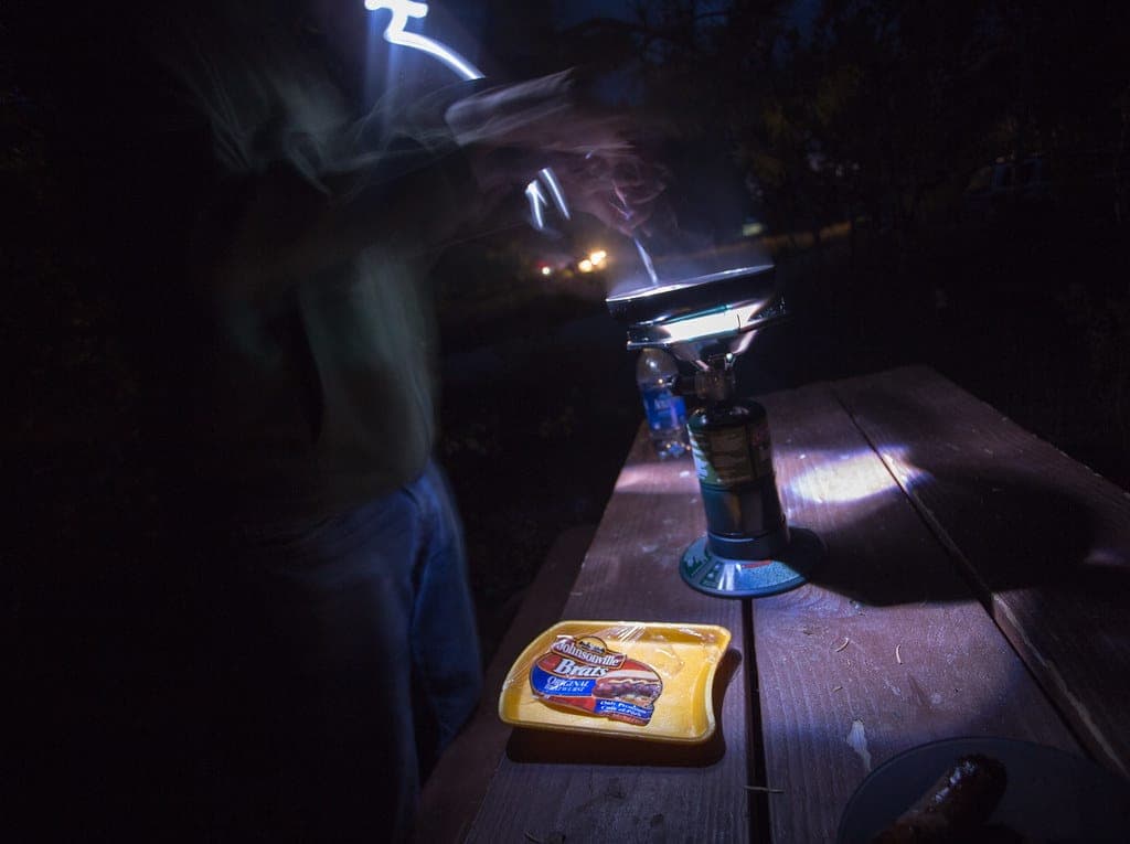A camp kitchen after a meal