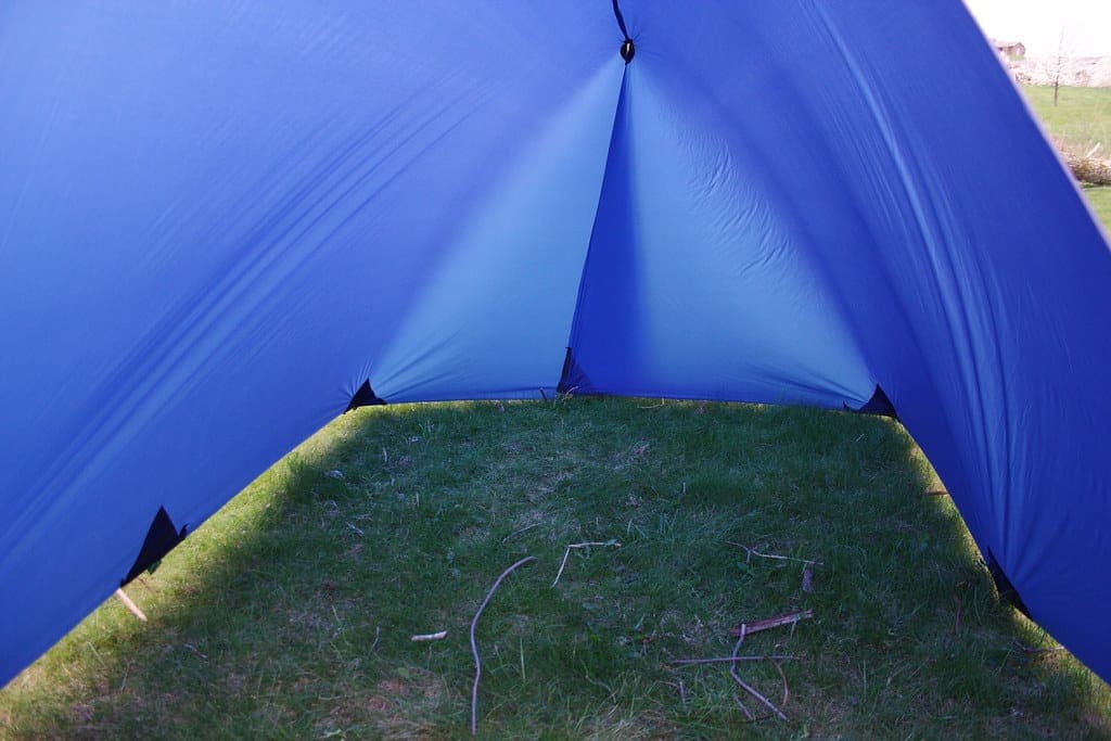 The inside of a pitched tent showing the sleeping area