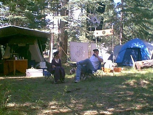 Campers talking at a campsite